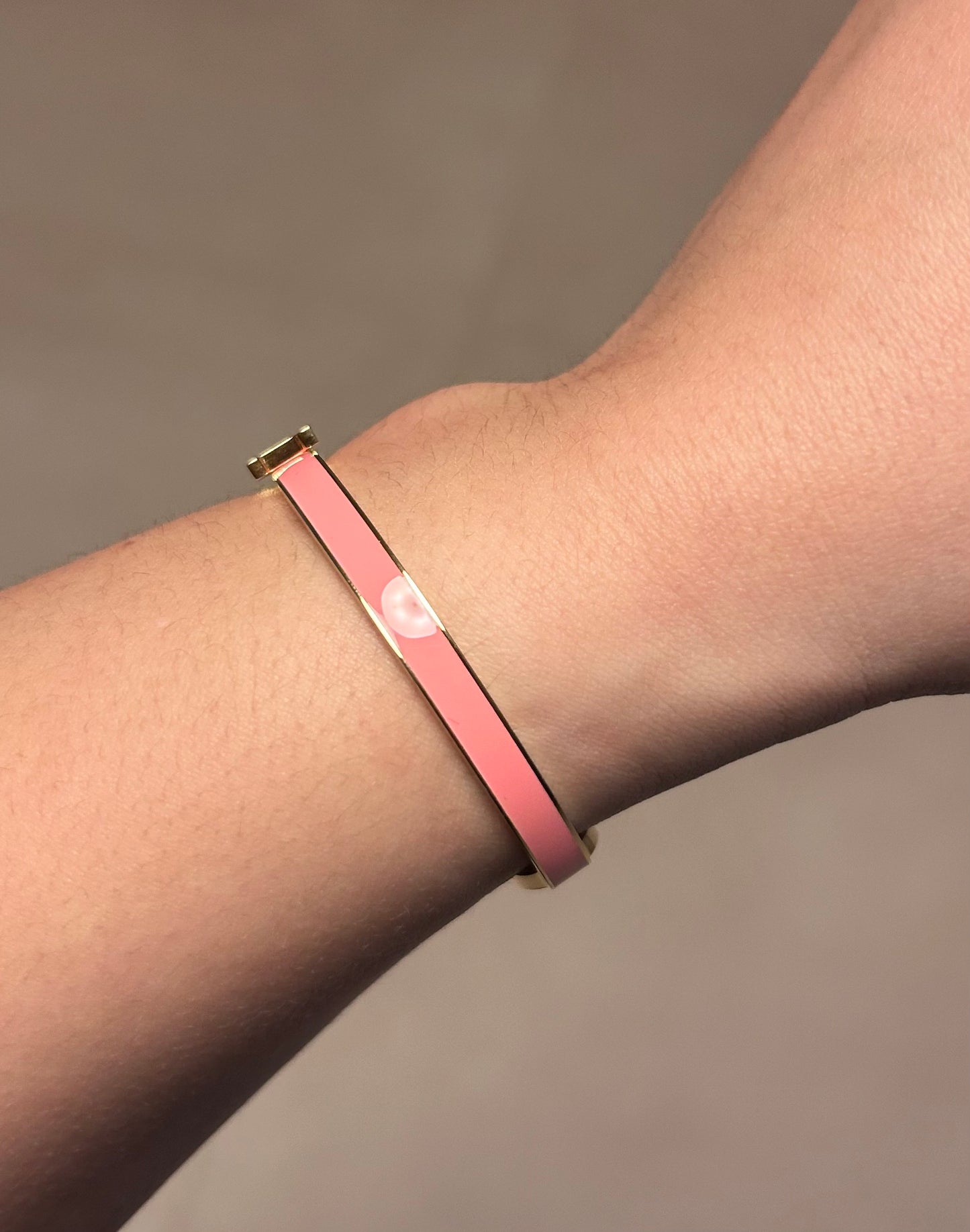 H pink bracelet